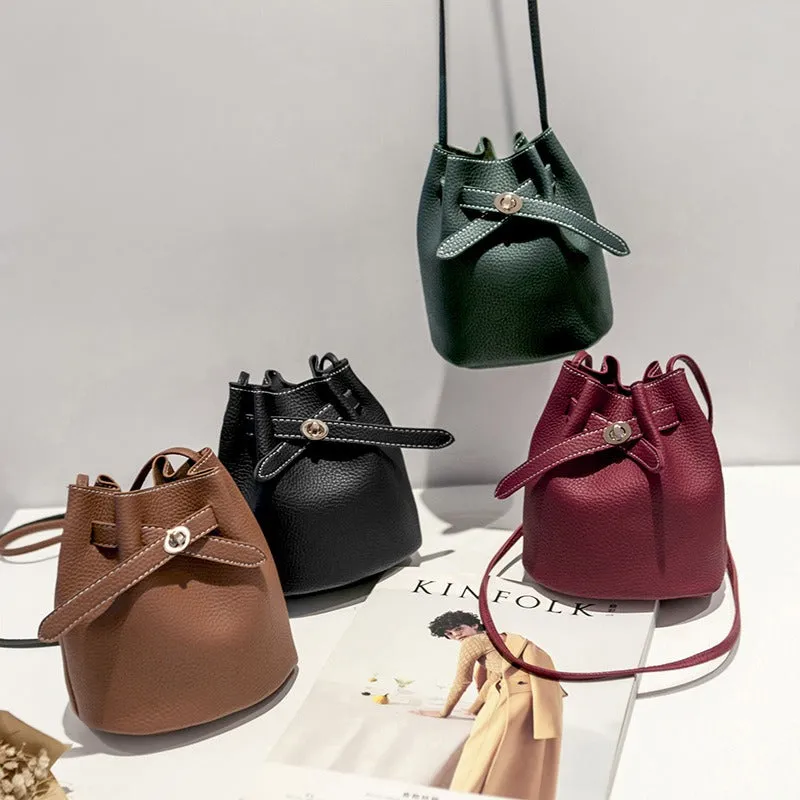 Guangzhou supply 2024 new simple bucket bag wide-band lock small bag Korean version casual solid color single shoulder