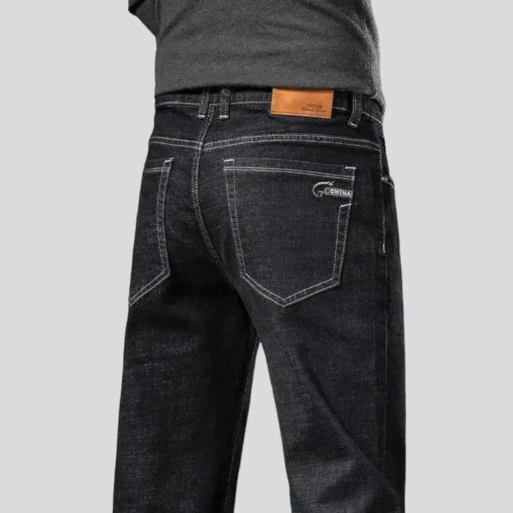 Stretchy men's mid-waist jeans